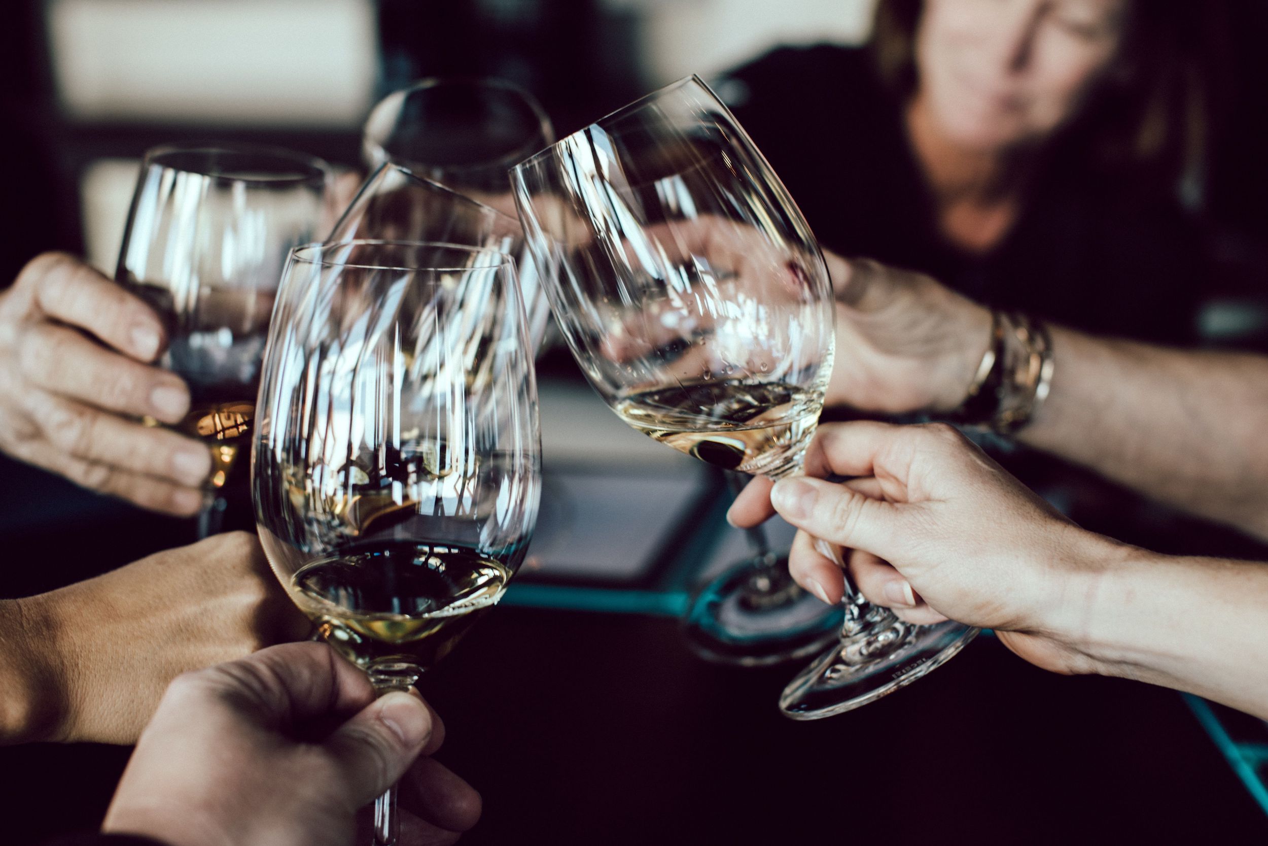 white wine toast at steakhouse