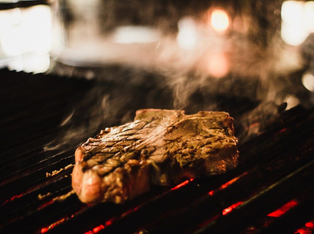 Steak searing on grill